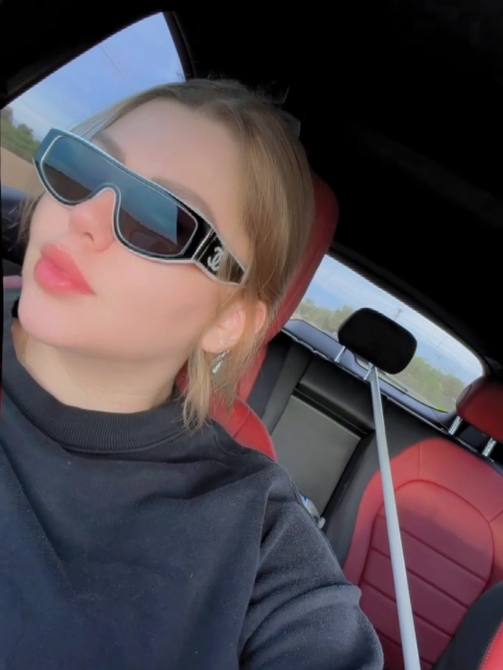 CHANEL Black Shield Sunglasses with Silver Accents